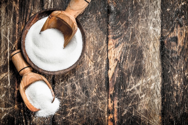 Sugar with a scoop in a bowl