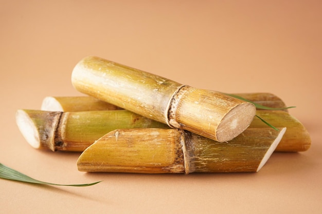 Sugarcane on a brown background Closeup