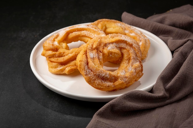 Sugared donuts on the table Brazilian donuts