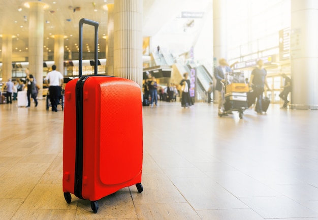 Suitcase in airport airport terminal waiting area with lounge zone 