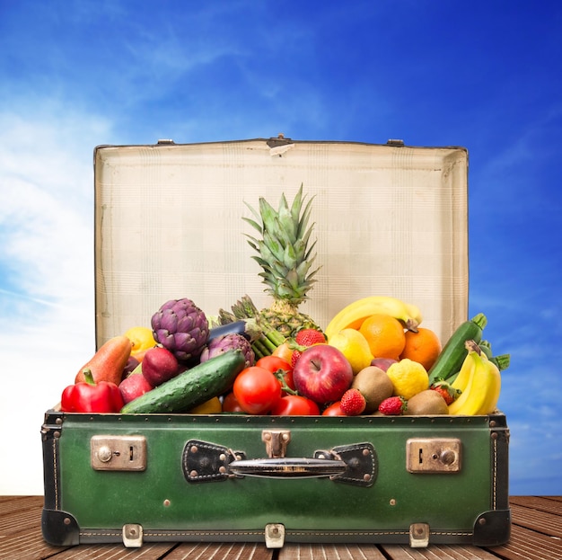 Suitcase full of fruit and vegetables