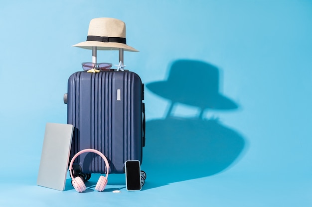 A suitcase is placed on a blue background