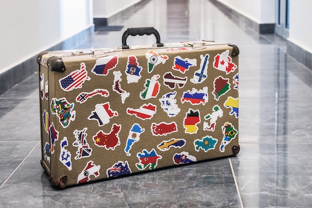 Suitcase stickers of the flags of the countries from travels  