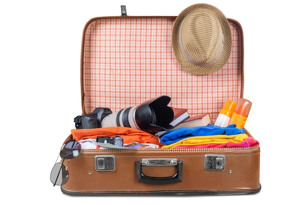 Photo suitcase with clothes and other travel accessories