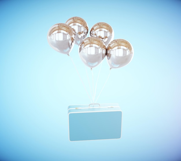 Suitcase with silver balloons