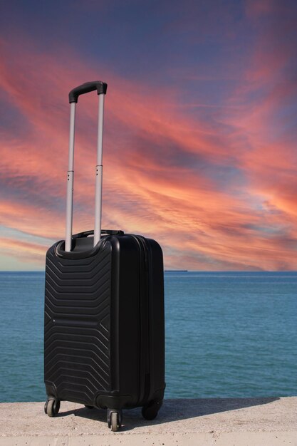 A suitcase with the word travel on it