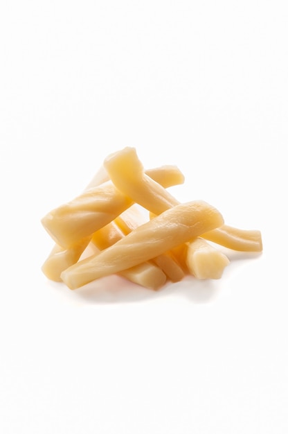 Suluguni cheese sticks for beer. On white background. Isolated. Close-up.