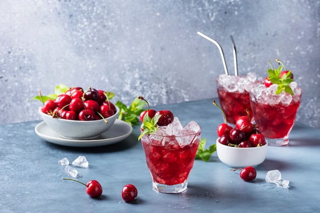 Summer alcoholic cocktail with cherries