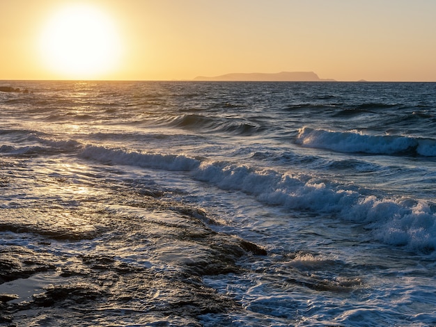 Summer background with tropical beach during sunset