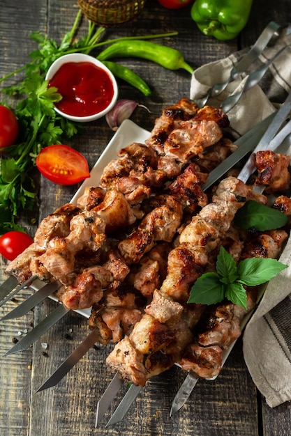 Summer Barbecue menu Grilled meat skewers on rustic wooden table