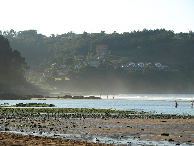 Summer beach in northern Spain with sea mist Travel Copy space Selective focus