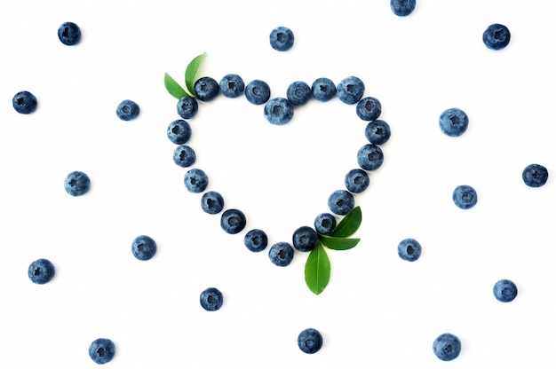 Summer blueberry heart frame detox background. Love berries border design. Close up top view