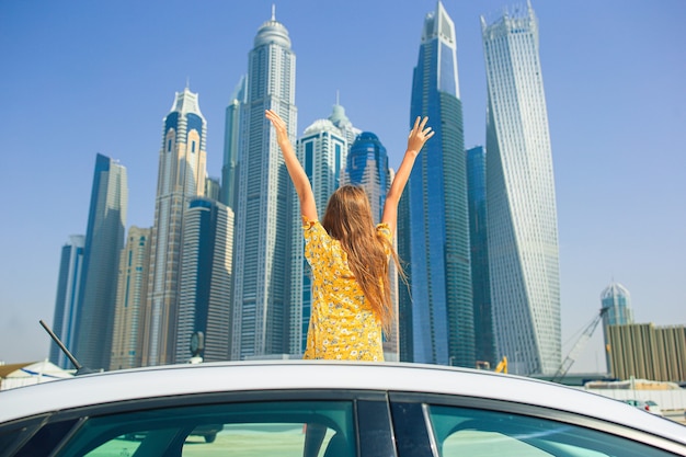 Summer car trip and adorable girl on vacation