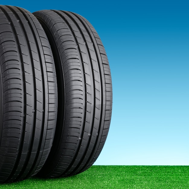 Summer car tyres on grass