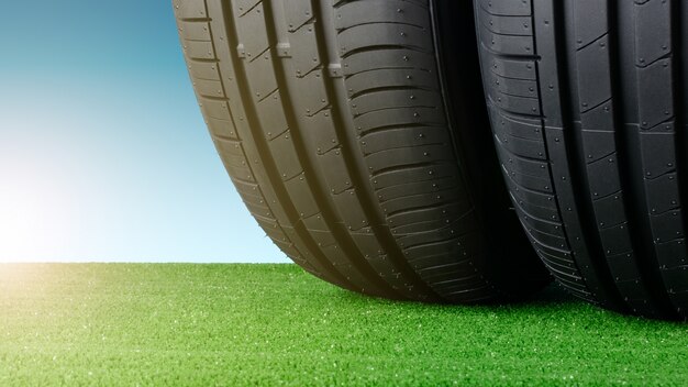 Summer car tyres on grass