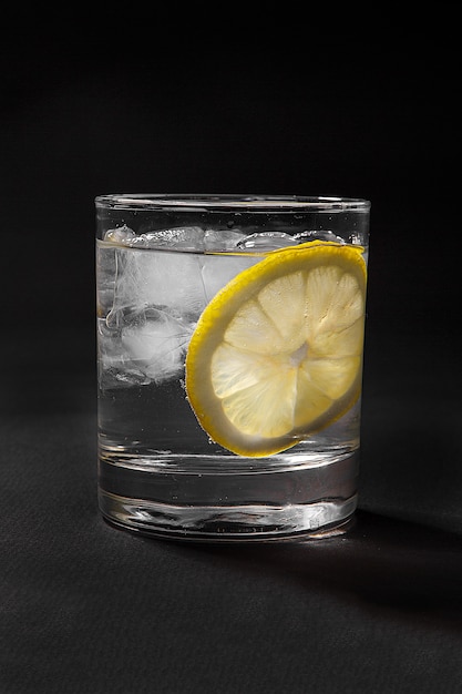 Summer cocktail on isolated black