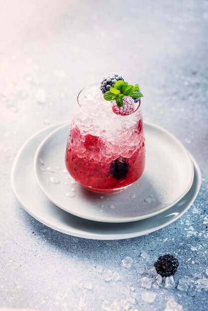 Summer cocktail with berry