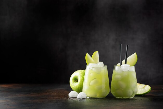 Summer cocktail with green apple and ice