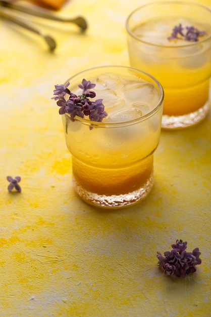 Summer cocktail with mango juice and ice