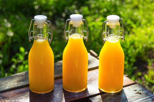 Summer cold orange juice in bottles