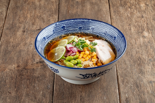 Summer cold ramen noodle soup with chicken