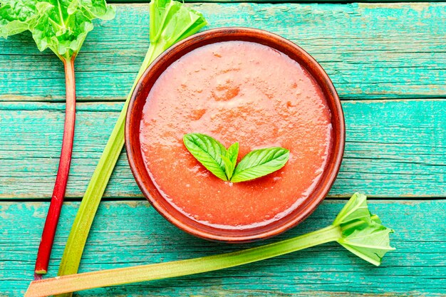 Summer cold rhubarb soup in a plate