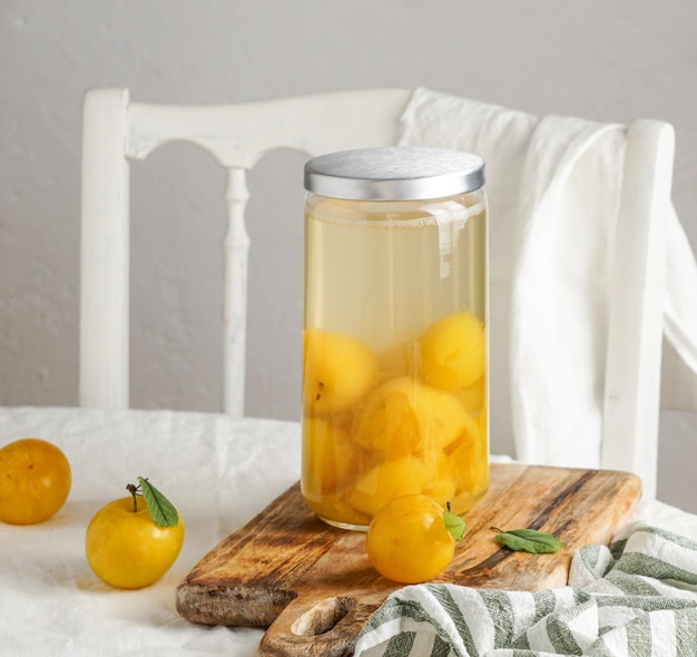 Summer Compote from yellow plums. Preservation in a glass jar. preparations for the winter, for future use