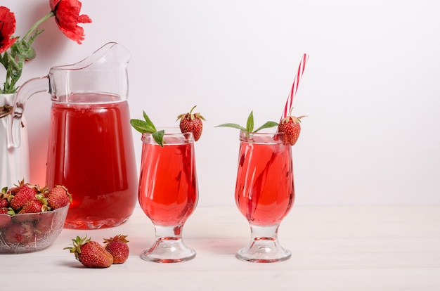 Summer cooling drink with strawberries and ice with copy space.