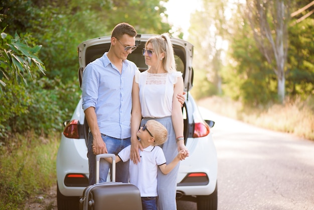 Summer day and car trip. Young family travel.