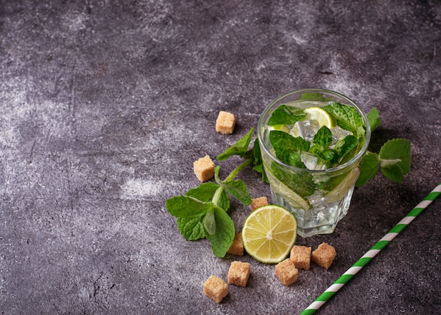 Summer drink mojito with rum, mint, ice and lime