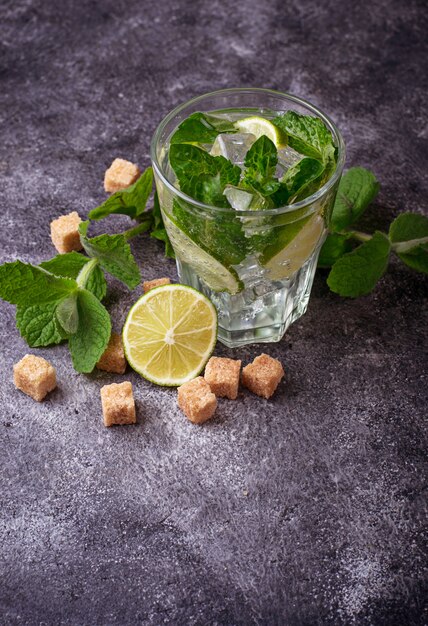 Summer drink mojito with rum, mint, ice and lime