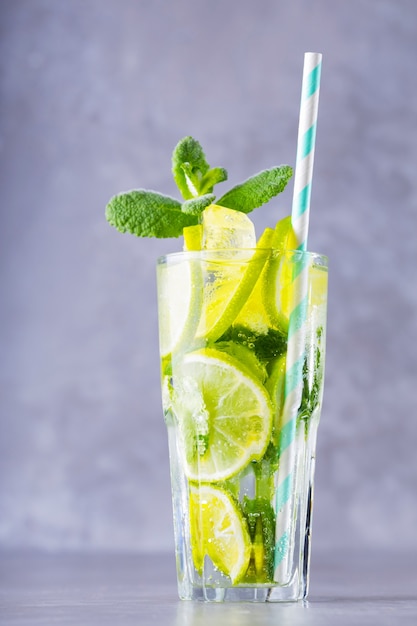 Summer drink with lime, mint and ice