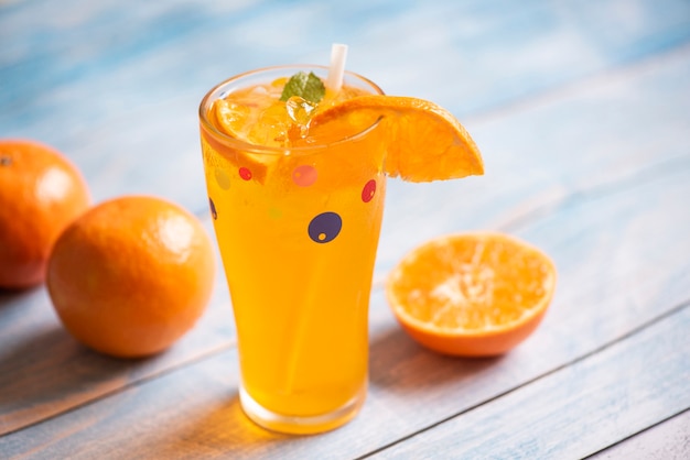 Summer drinks refreshing of cold drinks glasses fresh fruit orange summer drink juicy orange slice