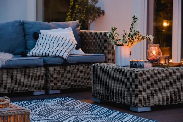 Summer evening on the patio of beautiful suburban house with garden