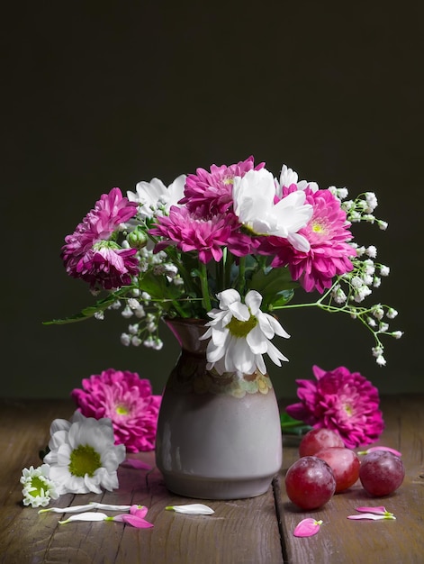 Summer flowers in a ceramic vase Still life