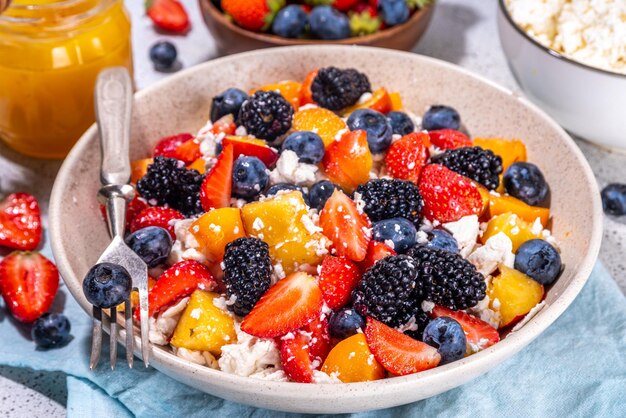 Summer fruit and berry salad with cottage cheese