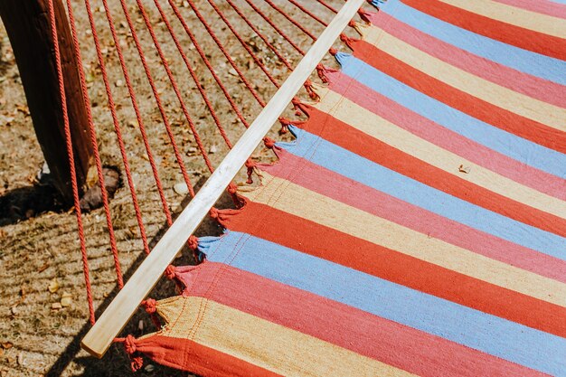 Summer garden with hanging hammock for relaxation