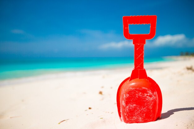 Summer kid&#39;s beach toy in the white sand