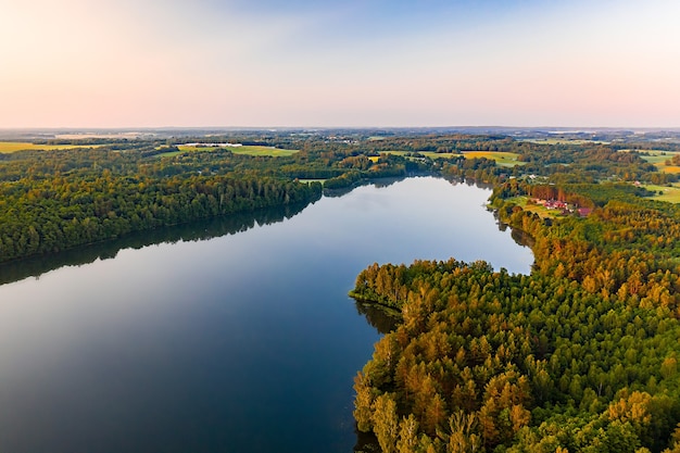 Summer morning landscape on the lake aerial view