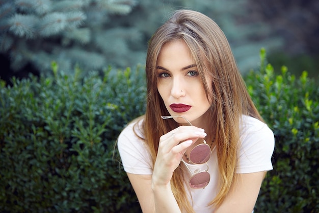 Summer portrait of a beautiful girl