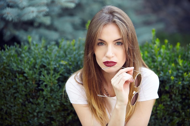 Summer portrait of a beautiful girl