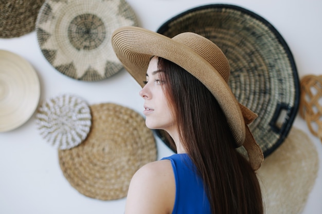 summer portrait of a young beautiful woman with dark hair