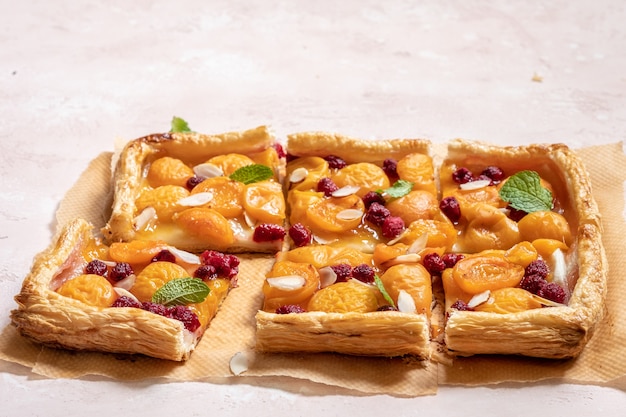 Summer puff pastry tart with apricots and raspberry