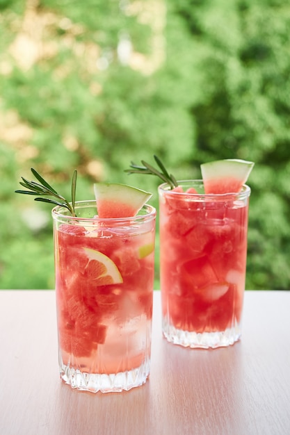 Summer refreshing drink with ice, slices of watermelon, lemon. Summer time, Summer drink