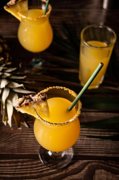 Summer refreshing tropical drink juice or cocktail with pineapple juice and tequila