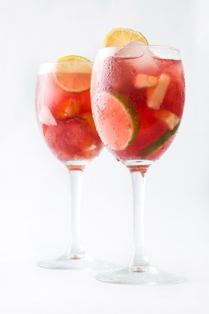 Summer sangria in glass isolated on white