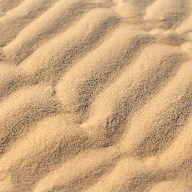 Летняя текстура морского песка бесшовное солнце