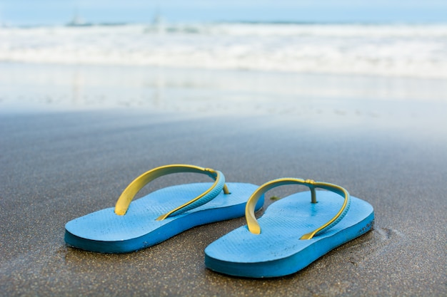 summer shoes on sand