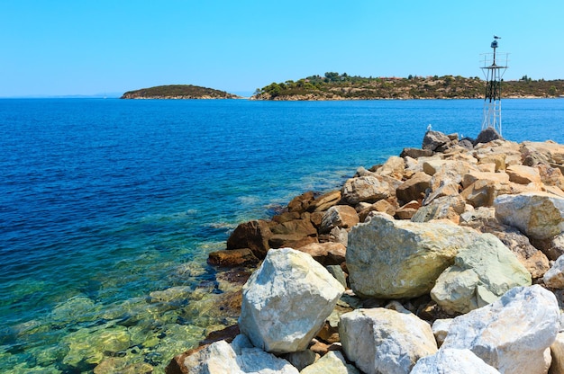 Summer Sithonia coastline and Aegean sea scenery (Lagonisi, Halkidiki, Greece).