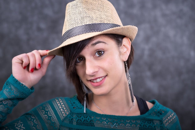 Summer, smiling young  woman and straw hat